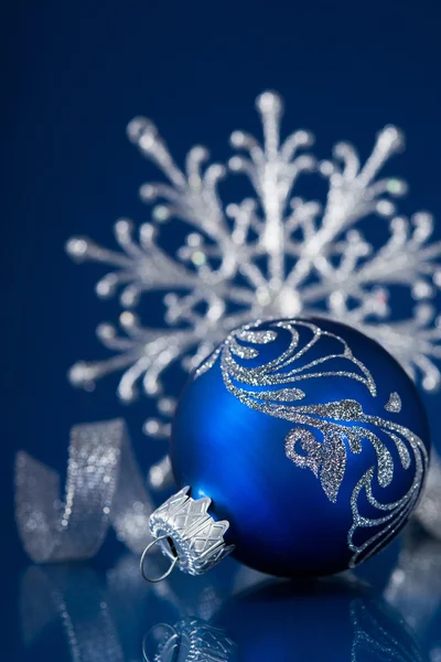 Blue and silver christmas ornaments on dark blue xmas background with space  for text Stock Photo by ©elenadesigner 55881521